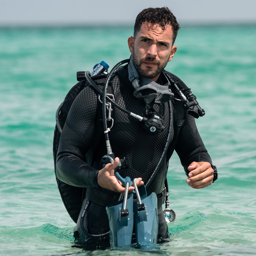 Diver wearing Fourth Element Xenos ARC 3mm wetsuit during warm-water dive